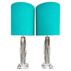 A pair of French 1970s faceted crystal glass lamps with chrome fittings