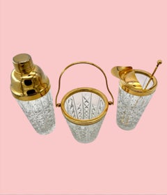A 1950s Val Saint Lambert crystal and gold plated cocktail set