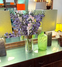 A large Italian 1960s glass vase with brass top rim.