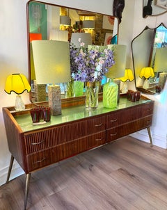 An wonderful Italian 1950s mid century sideboard with orignal back mount mirror