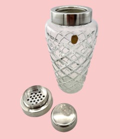 A 1930s Art Deco cut crystal and silver plated cocktail shaker by WMF