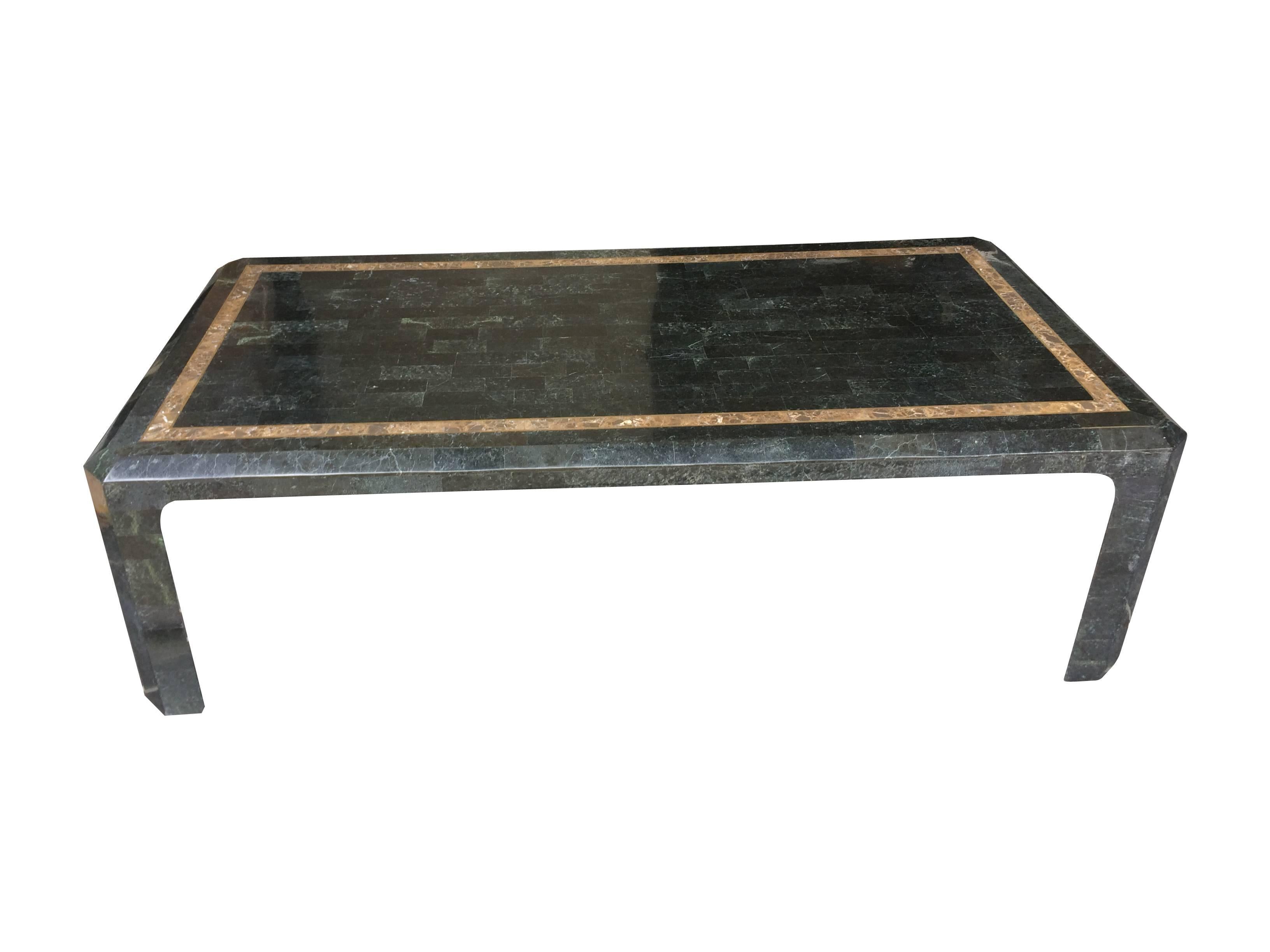 A Maitland-Smith tessellated marble and black / dark green stone coffee table, with brass inlay around the marble on a wooden frame. Beautifully made and in great condition.