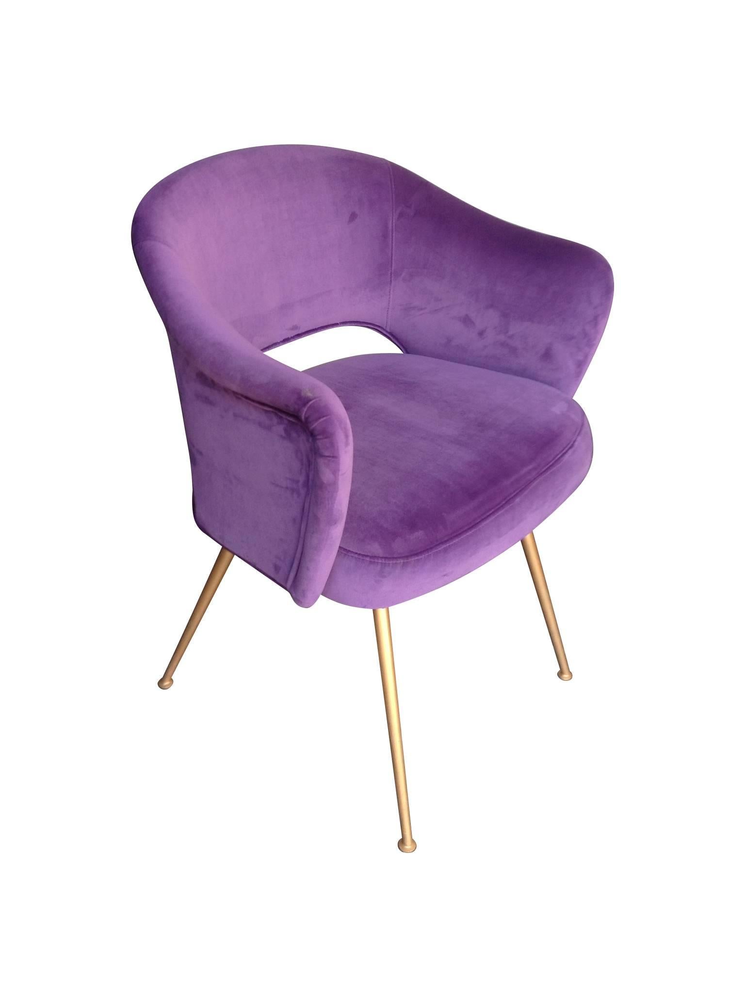 A pair of Italian cocktail chairs with gilt metal legs and re-upholstered n purple velvet. These chairs are extremely comfortable and would work as dining, office or bedroom chairs.