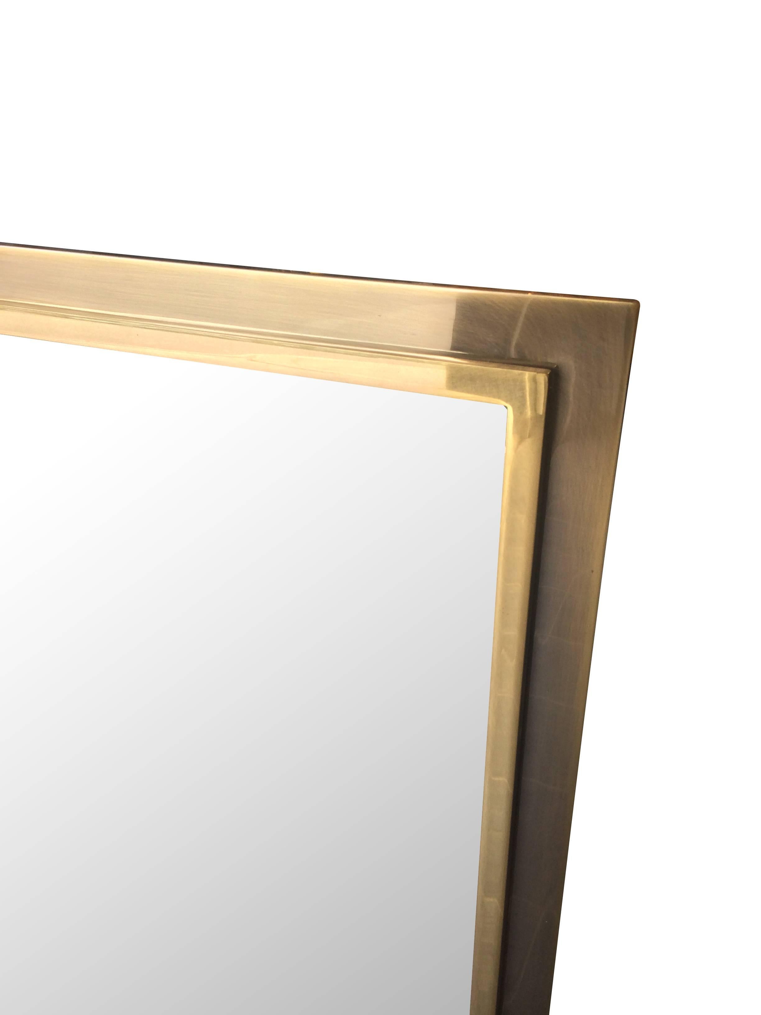A Belgo chrome mirror with smoked gilt metal and brass surround. 
Also available is matching console see other listing.