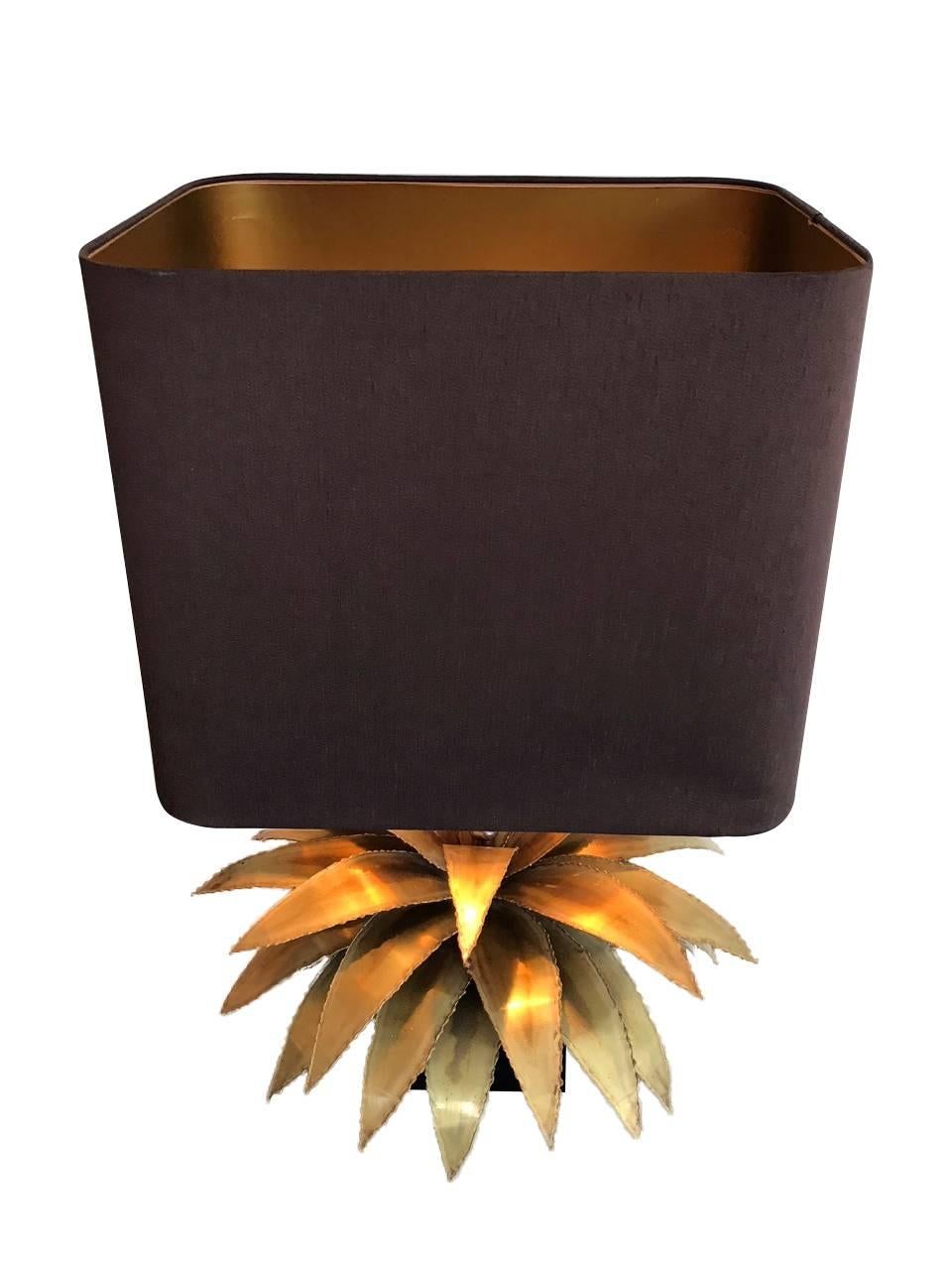 A lovely Maison Jansen brass palm tree table lamp in black lacquer base, with original square brown shade with gold lining.