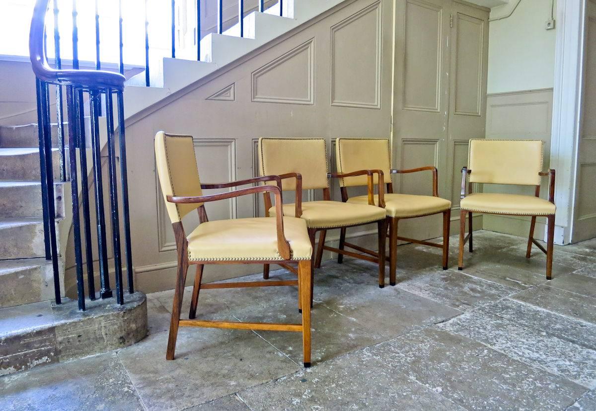 A really beautiful and rare set of four Danish armchairs, attributed to Jacob Kjaer. Beautiful rosewood with lovely patina and original light brown leather upholstery with brass stud detailing.

A very attractive set of armchairs, beautiful