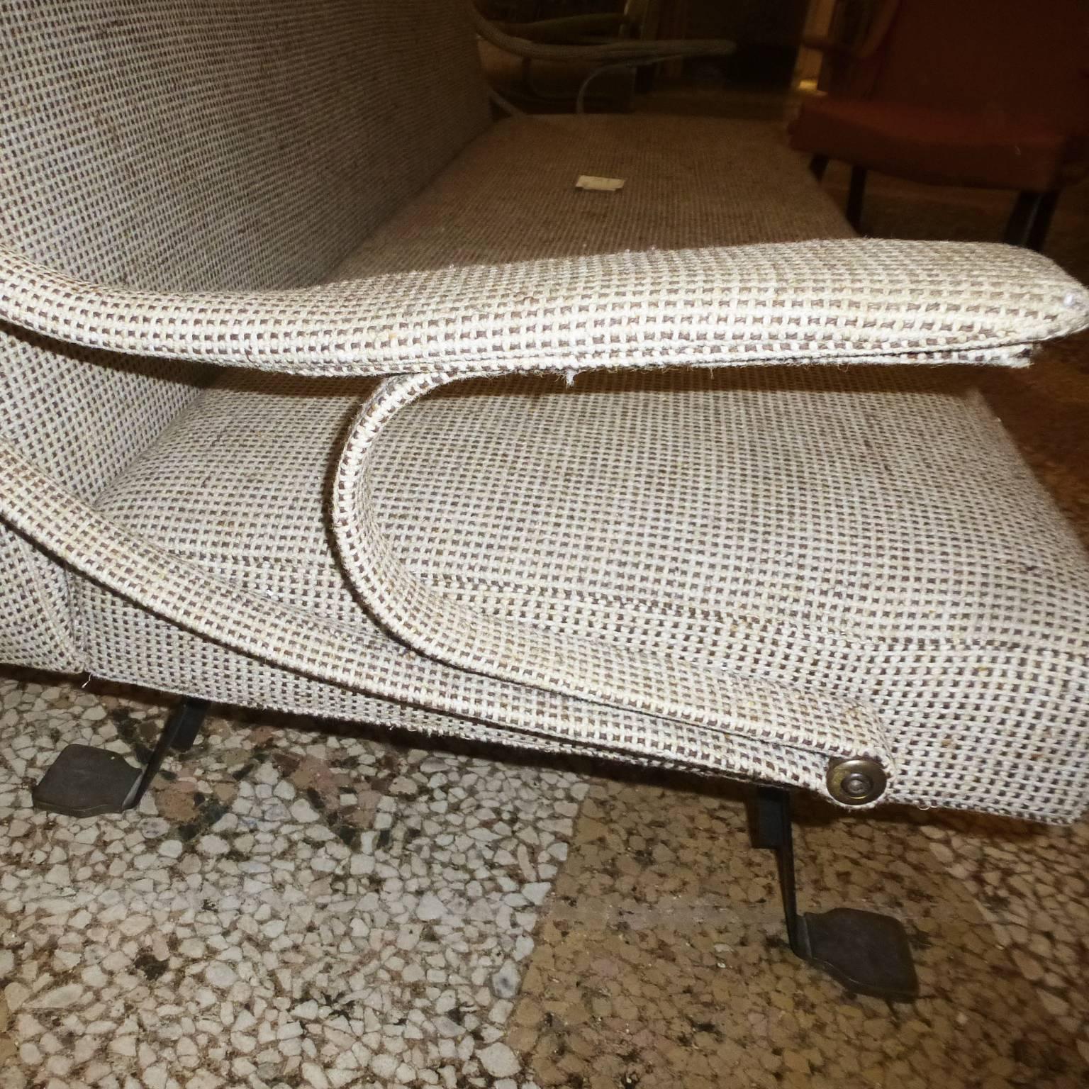 Diganna sofa by Ignazio Gardella produced by Azucena, Italy, 1950. 

Full steel enamel frame, with rubber padding on elastic straps, fabric covering and brass details.
