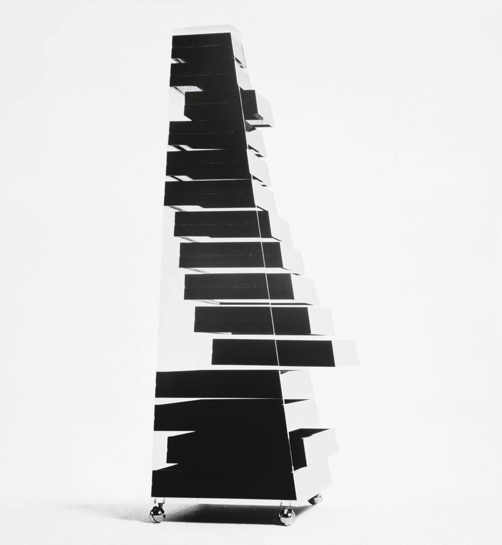 Chest of drawers on castors. Pyramid-shaped structure in transparent acrylic resin, 17 drawers in black acrylic resin. Designed by Shiro Kuramata and produced by Cappellini Spa.