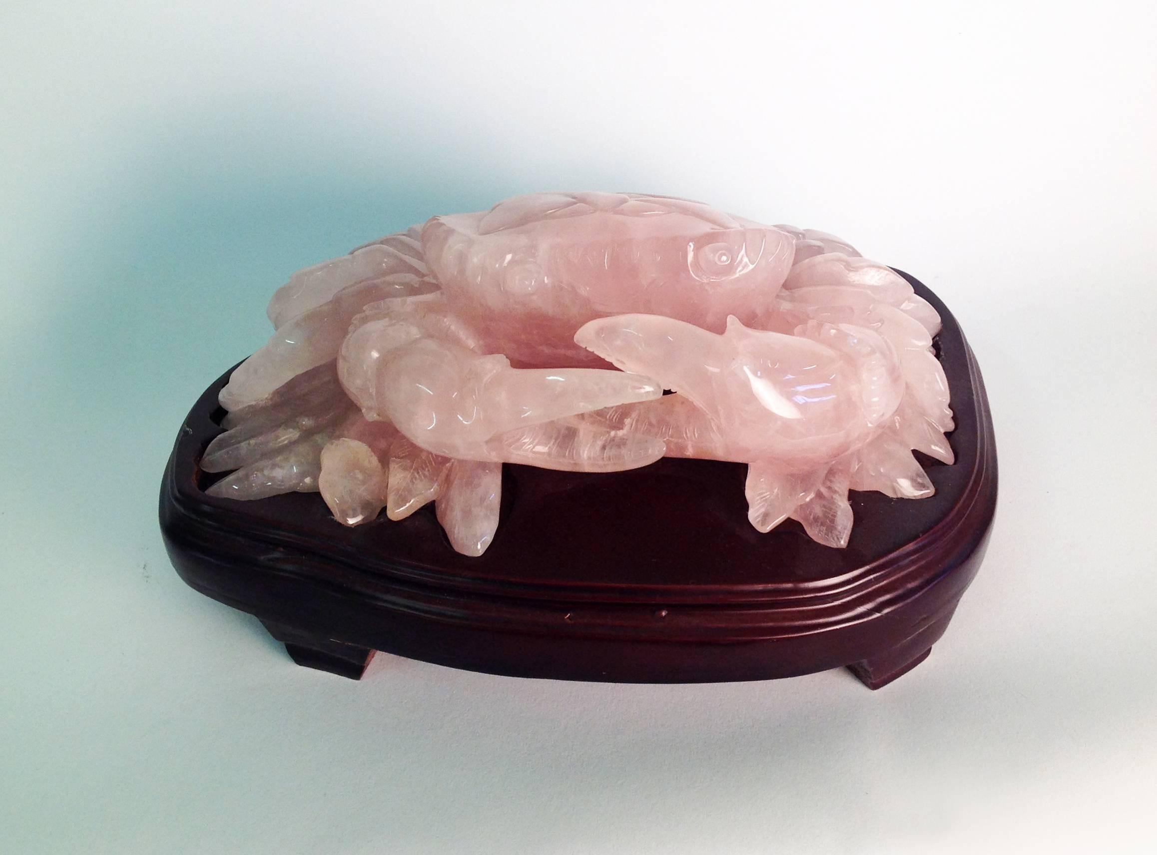 A beautiful sculpture in rose quartz with wooden base produced in China. Italian private collection. Weight Kg 4,59.