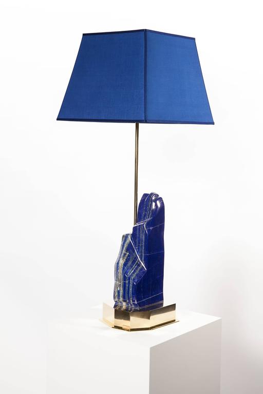 An elegant table lamp designed and produced Studio Superego, with big stone in lapis lazuli high 40 cm and foot in multifaceted and polished brass. Unique piece.

Biography
Superego editions was born in 2006, performing a constant activity of
