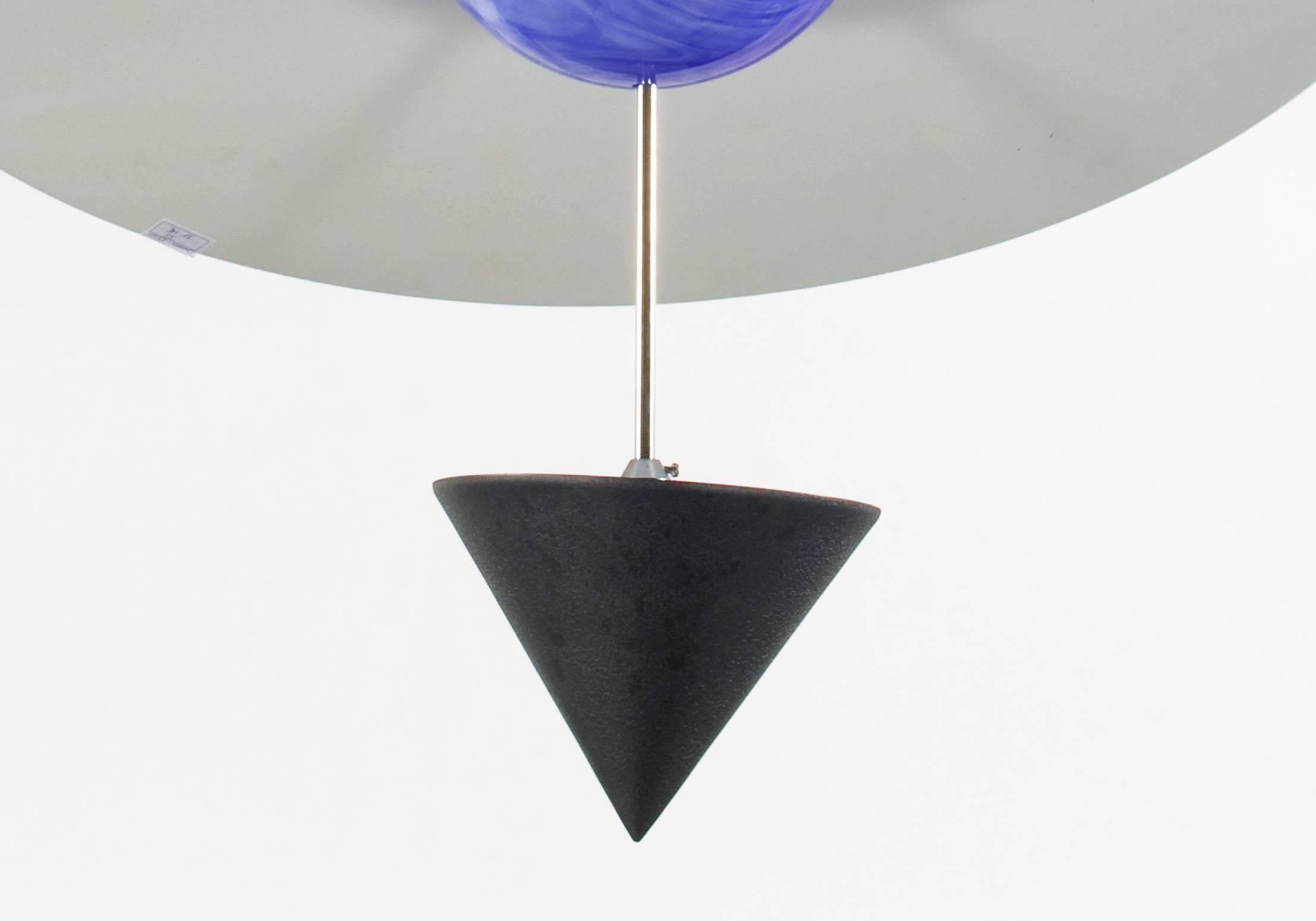 A chandelier model Saturno designed by Vico Magistretti and produced by Venini, Murano, 1990. Out production.