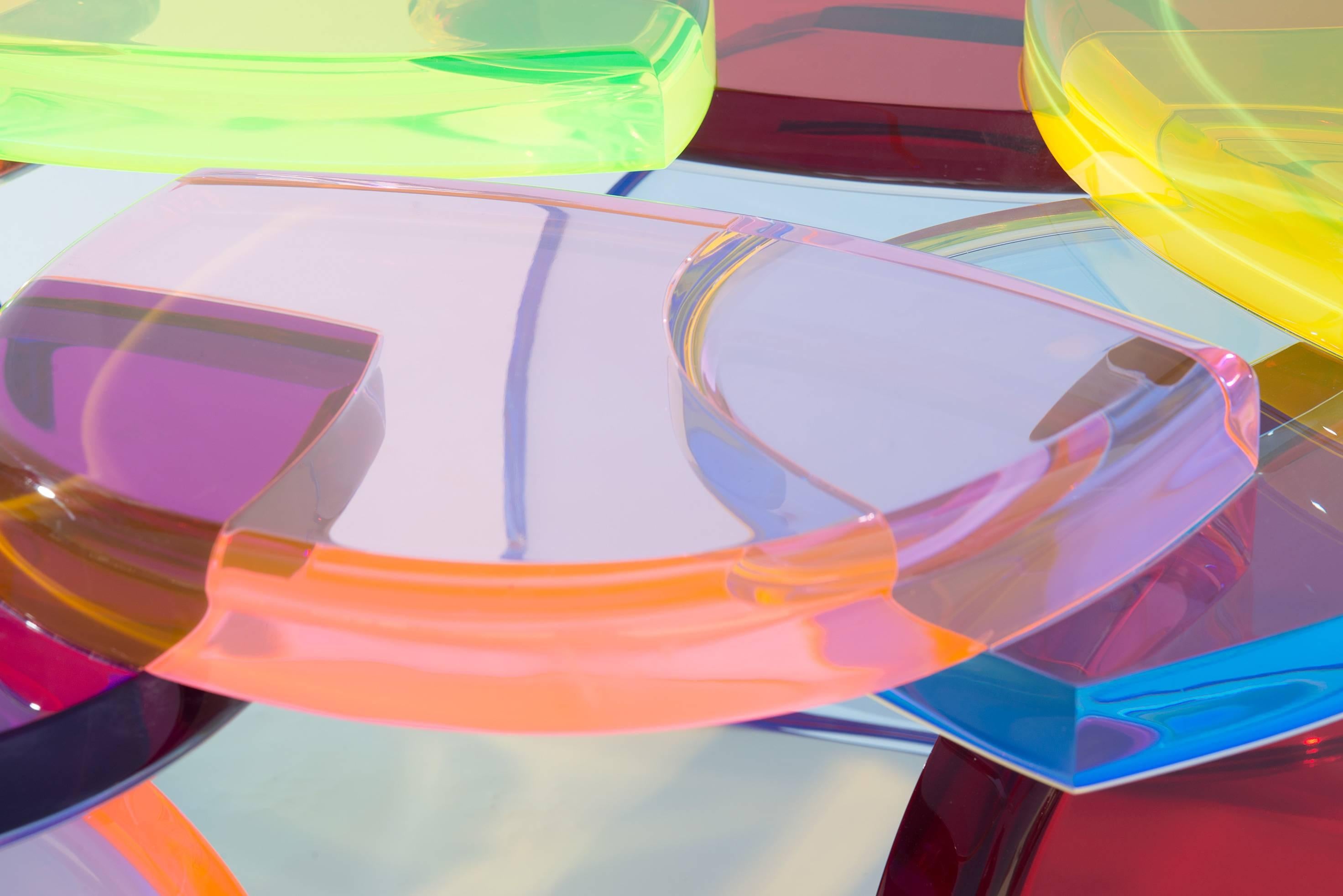 A beautiful coffee table with a structure of colored sequences of plexiglass modules that are repeated by building the shape.
A series of unique pieces designed and produced by Studio Superego.