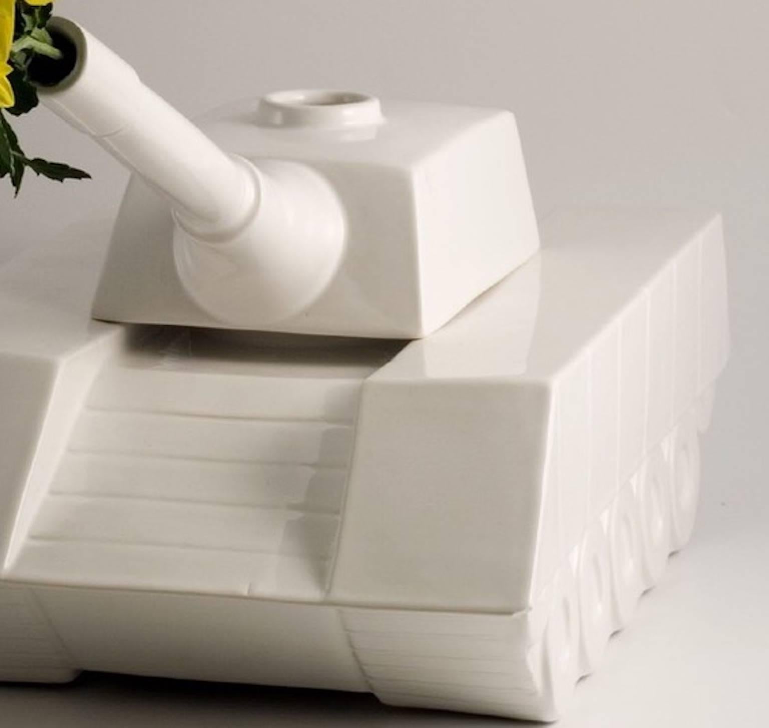 Love tank ceramic sculpture from Love Tank collection designed by Andrea Visconti for Superego Editions. Limited edition of 99 pieces. Signed and numbered.
This vase refers to the motif of the peace movement of the 1970s: 