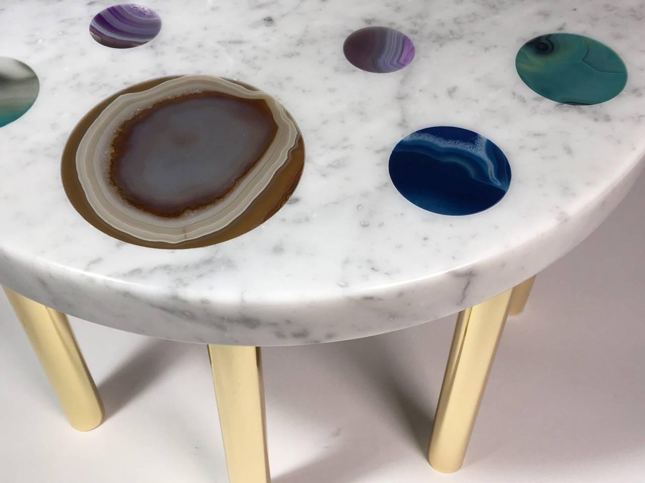 'Cosmos' coffee table in Carrara marble with agate disks of different colors and with brass designed and produced by Studio Superego in 2017.

Superego editions was born in 2006, performing a constant activity of research in decorative arts by
