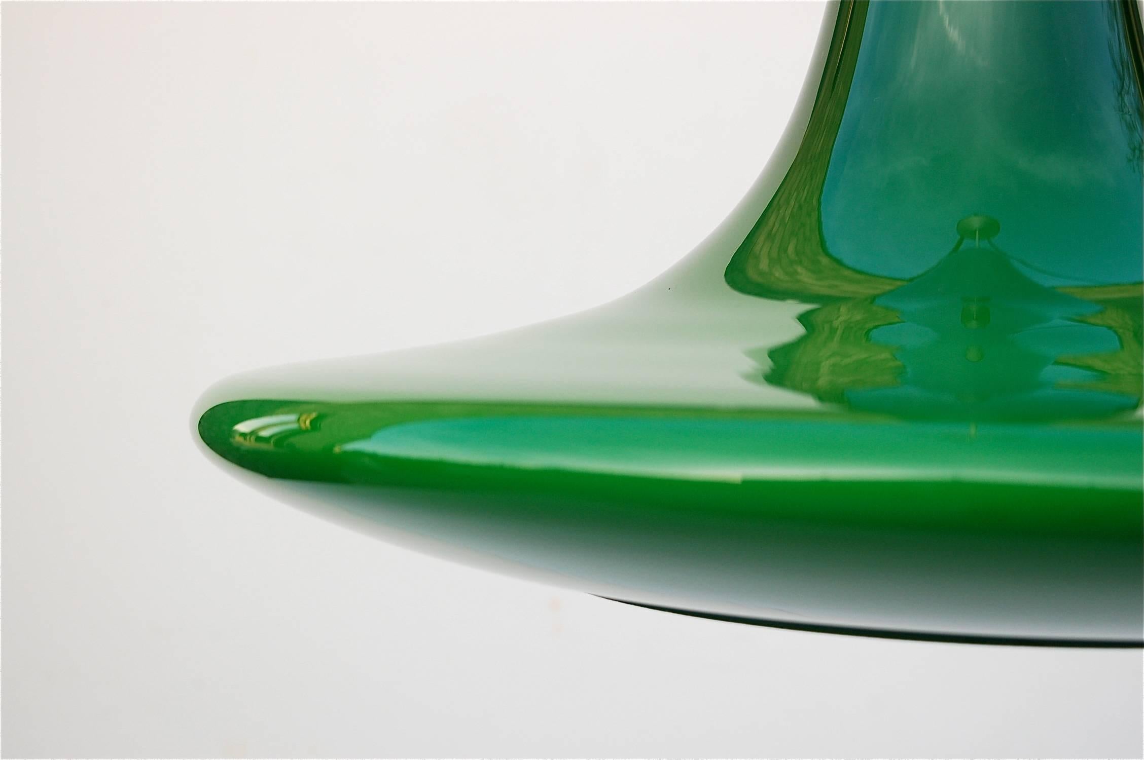 Large, green, organic shaped pendant ceiling lamp designed by quality glass manufacturer Peill and Putzler from Germany. Although made from one solid piece of Murano glass, there is a wonderful play of light and shade because of the way the shape