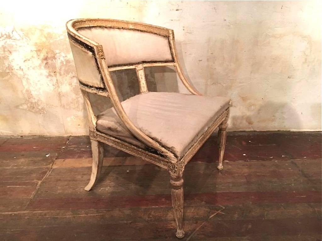 A rare 18th century Gustavian period barrel back chair in original paint. Available as a single chair, or as one of a pair, Swedish, circa 1790.