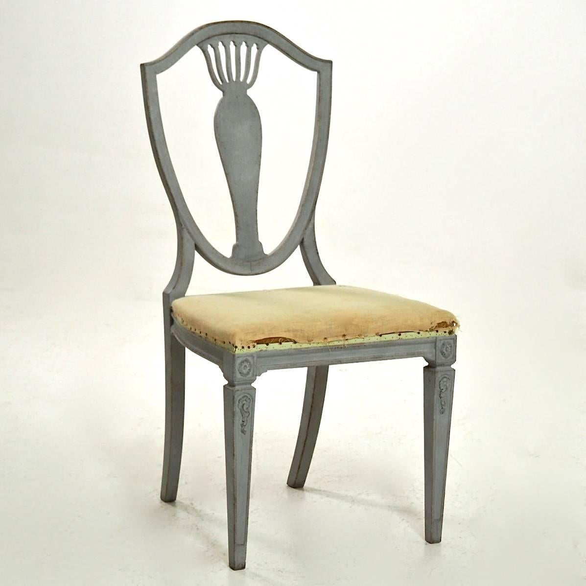 A wonderful set of eight decoratively carved Gustavian style shield back dining chairs ready for upholstery in a beautiful fabric of your choice. These elegant Swedish chairs date from circa 1910.

Continental US shipping:
We ship to the United