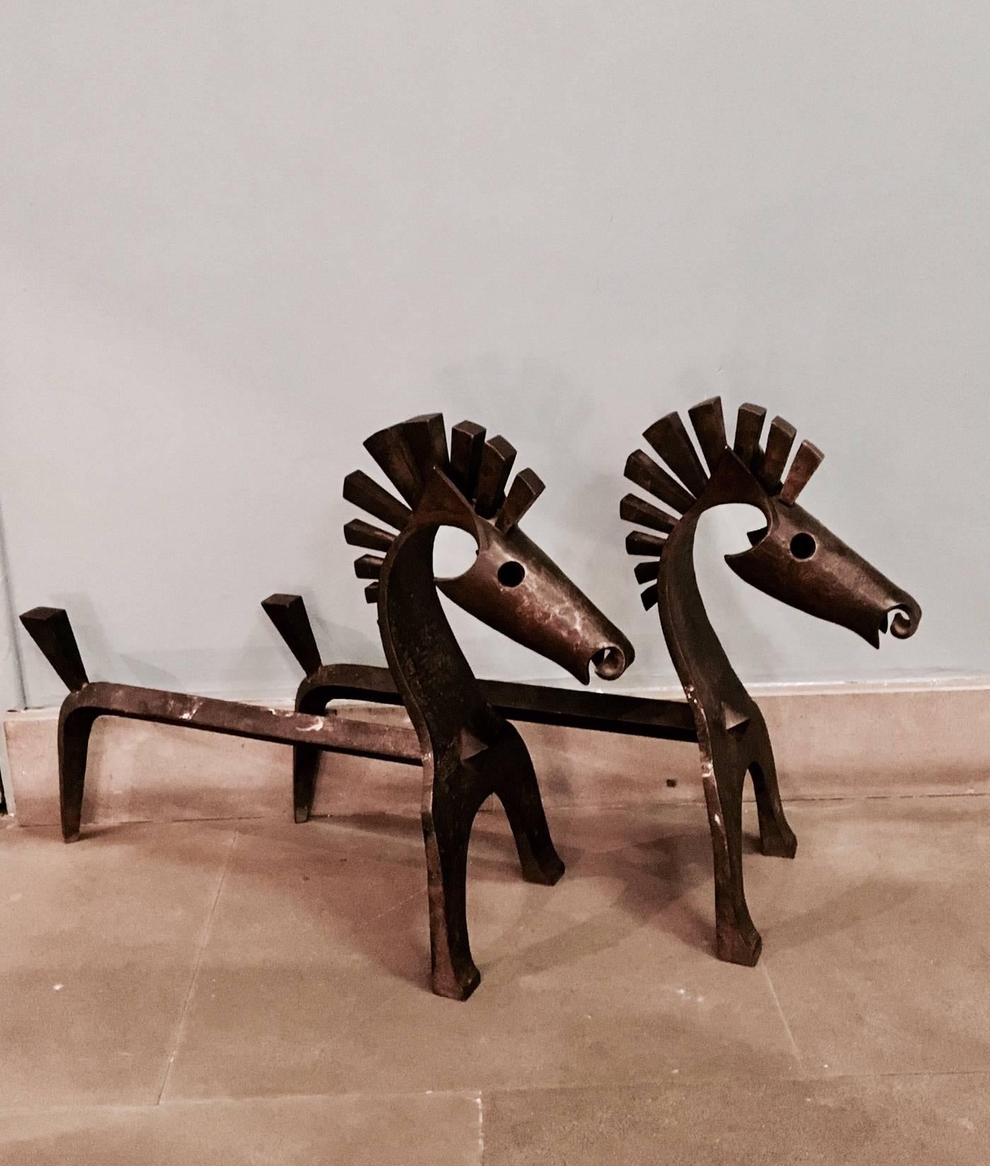 Rare firedogs in wrought iron, horses model. 
Bibliography : 