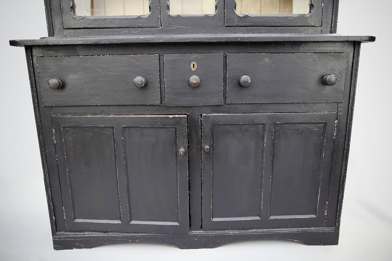 Early 19th Century 19th Century Georgian Irish Black Glazed Dresser w/ Primitive Carved Pediment For Sale