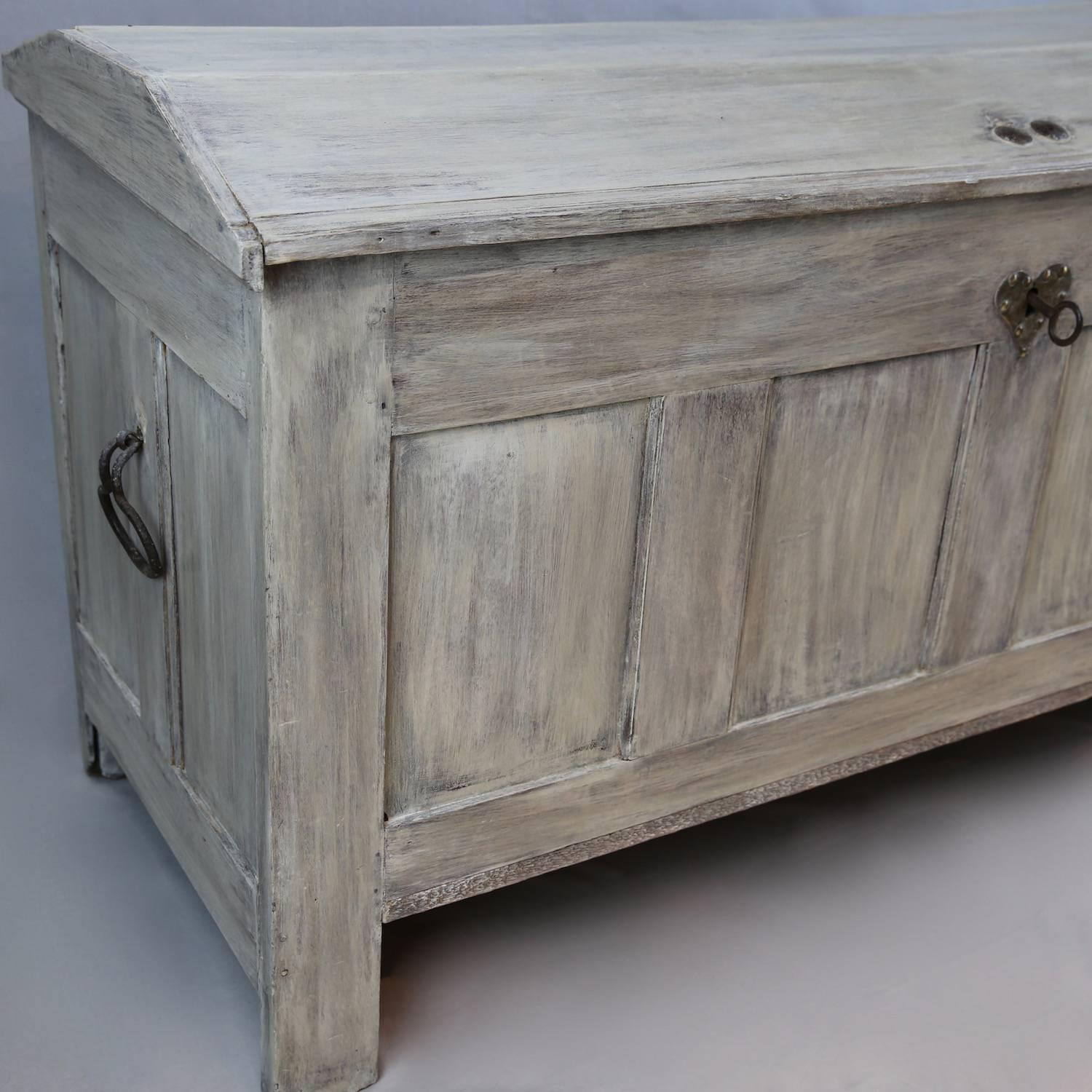 Close to your chest: A splendid late 1600s-early 1700s English oak chest with later paint finish. Having a quadruple panelled front, stile feet, iron side carrying handles, working lock and key, and a rather lovely, original, heart-shaped