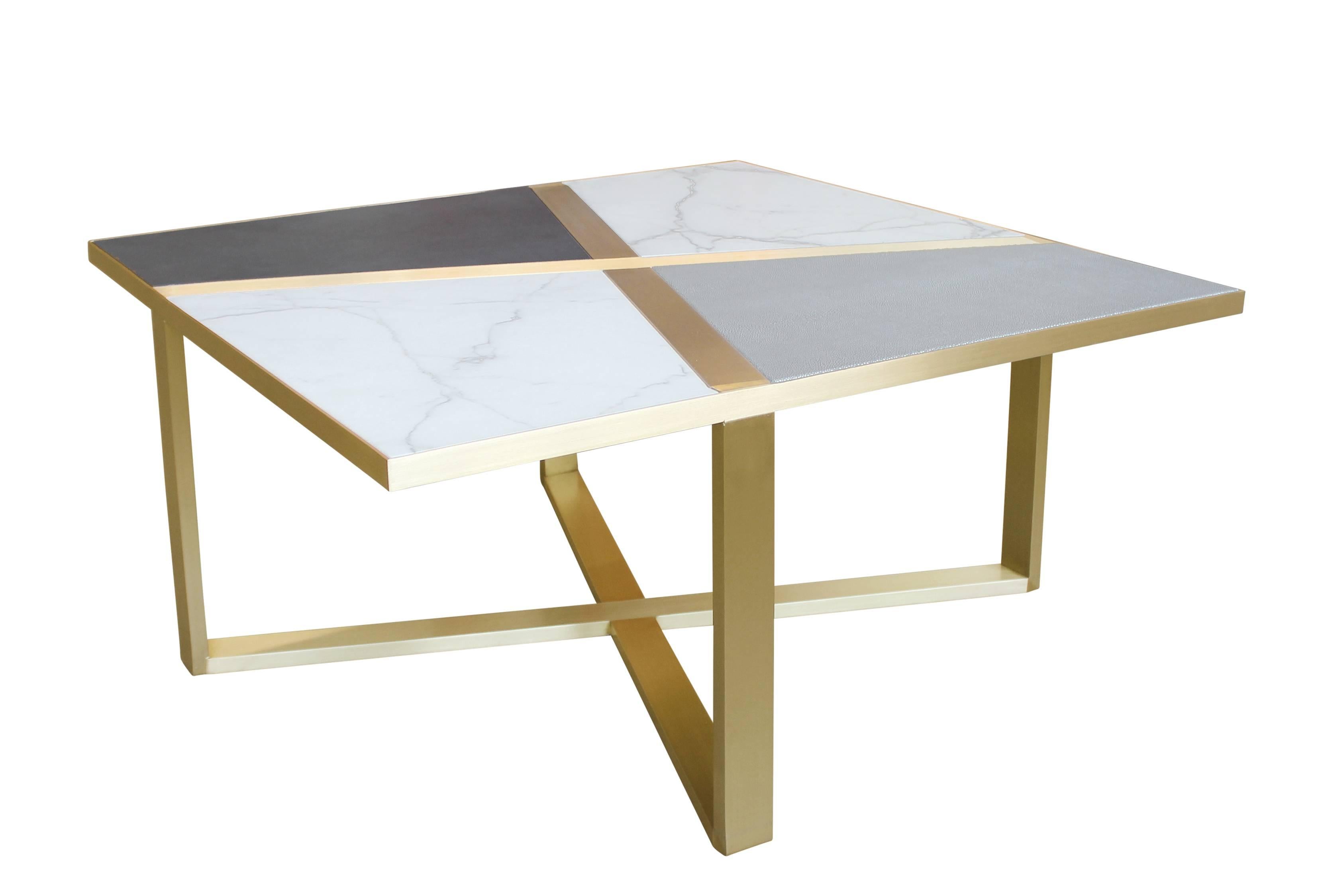 Bronze frame cocktail table with inset marble and leather panels. Available in custom sizes, finishes, materials, as well as COL. Each piece is made to order and be specified in any combination of material palettes.