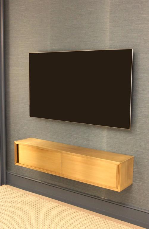 WallMounted Media Console in Patinated Bronze with Sliding Doors For