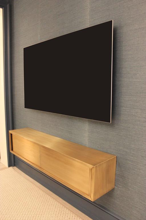 WallMounted Media Console in Patinated Bronze with Sliding Doors For