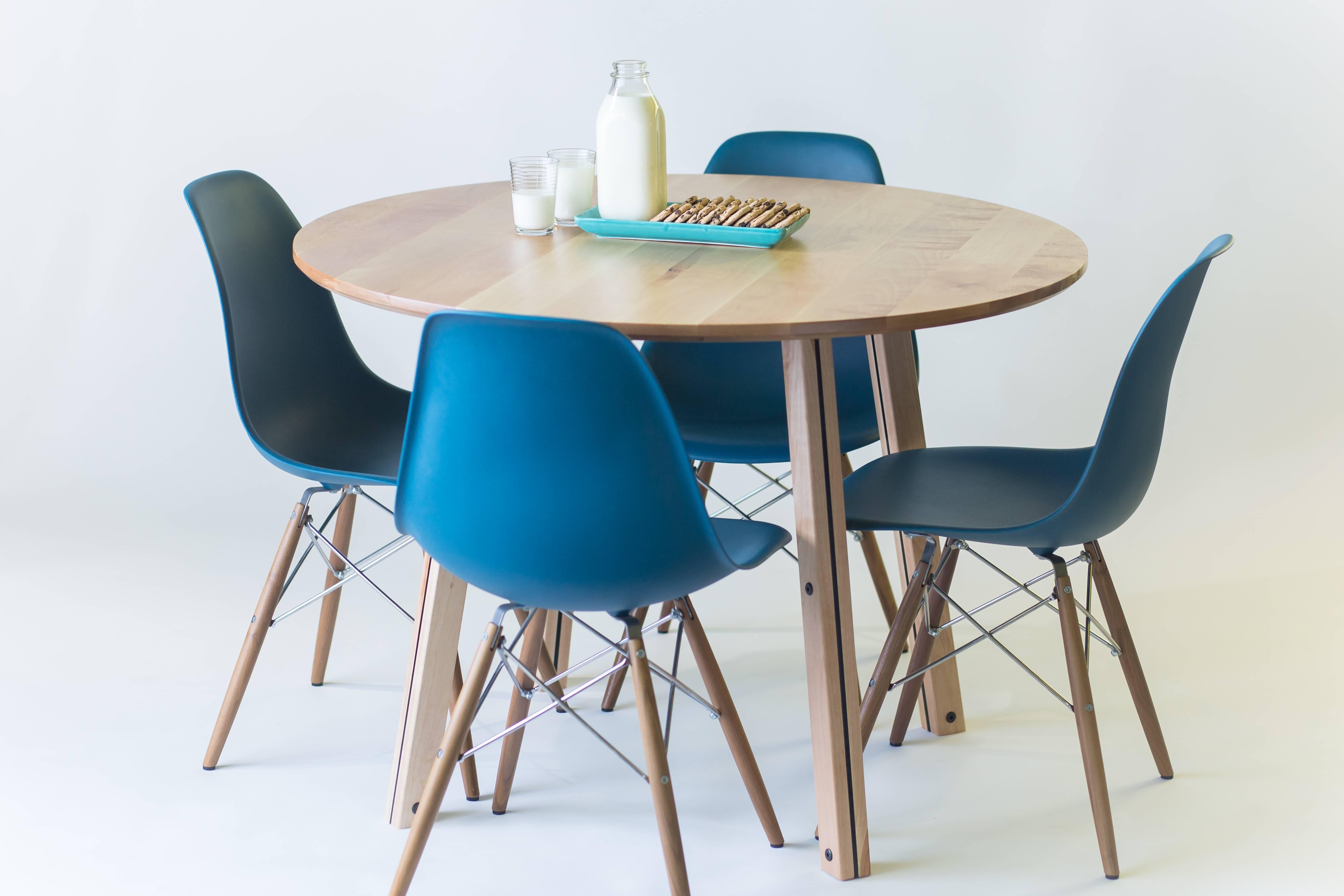 The Crux, Modern Birch and Powder Coated Steel Round Dining Table.

Made from solid birch and steel, the Crux is our nod to the Mid-Century bistro table. This simple and elegant design seats four comfortably with room to spare. 
Available in custom