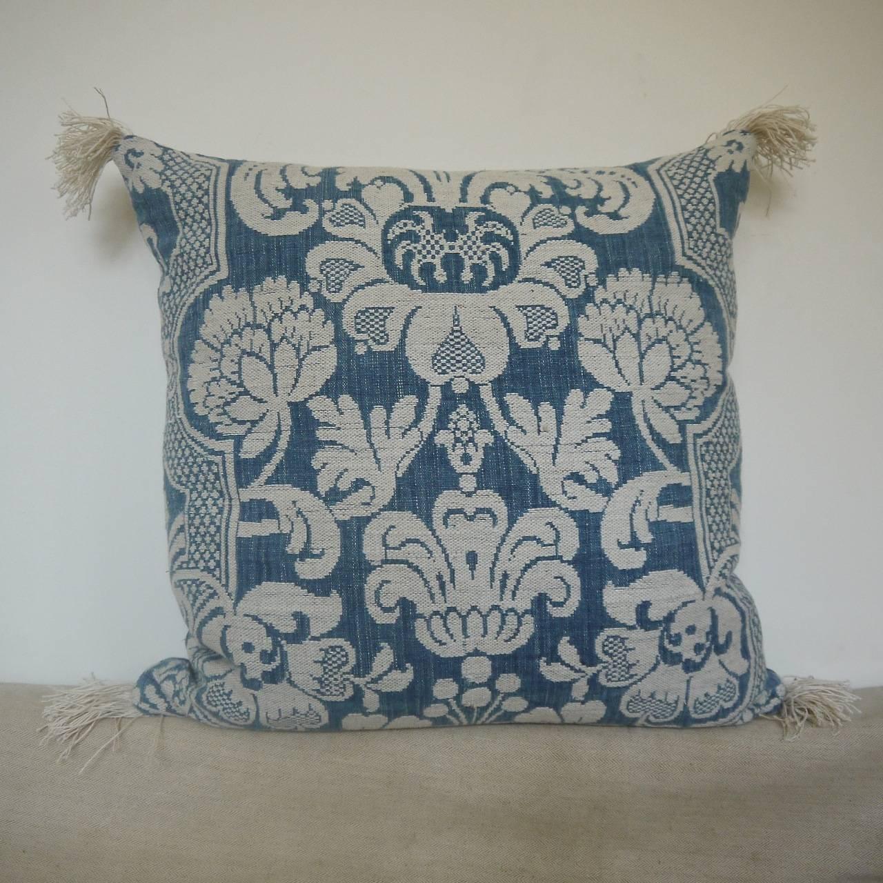 French circa 1760s woven linen and cotton cushion. Wonderful texture and contrast of weaves and yarns. With antique French linen fringing at the corners and backed in a dyed French 19th century linen. Slipstitched closed with a duck feather insert.