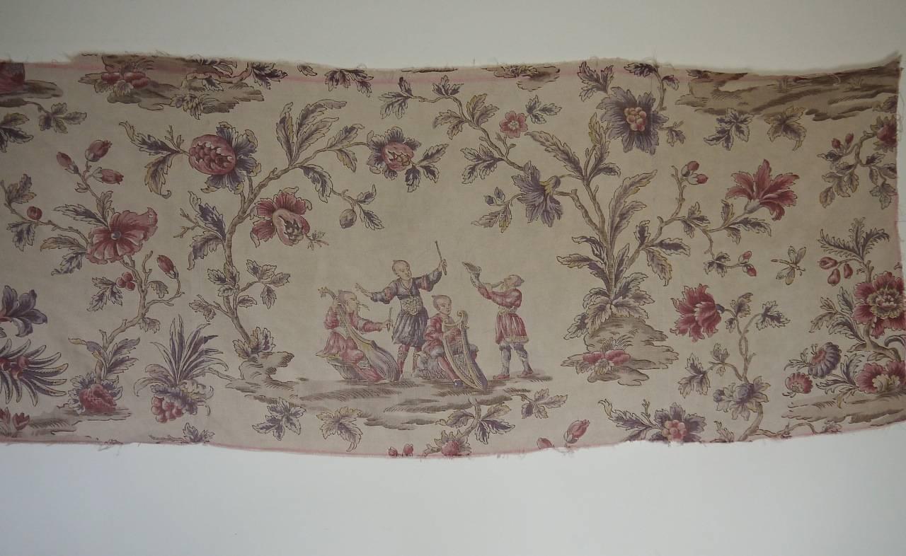 Late 19th-early 20th century large-scale French printed linen in lovely soft faded colors of rasberry, lilac and taupes. Chinoiserie figures playing instruments under exotic flowers and meandering branches. Some faded marks. Ideal for use as an