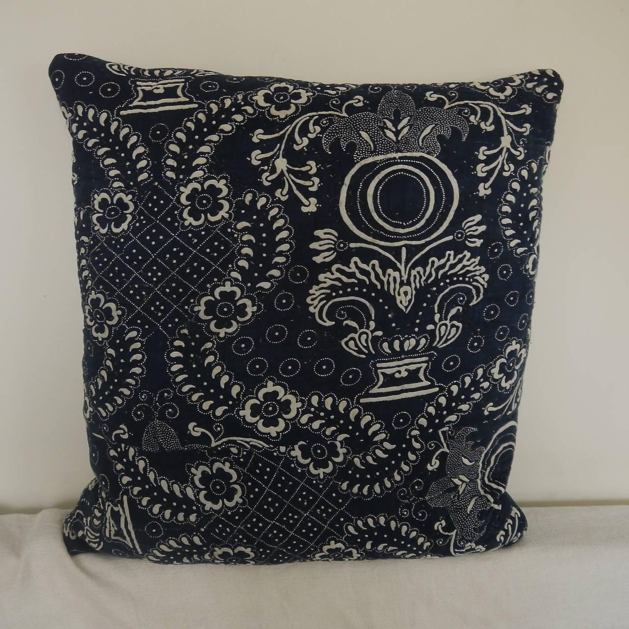 French Toile de Nimes indigo resist block printed cushion. Striking design of stylised pomegranates and floral motifs. Simply quilted and printed on a soft cotton. Towards the bottom of the quilt there is a seam going across with the pattern below