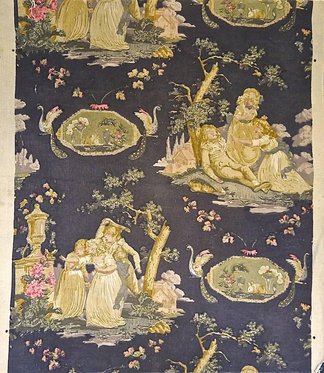 Early 20th century French toile with scenes of children in 18th century costume on a dark blue ground.With birds and medallions of rabbits.The design has a painterly feel.