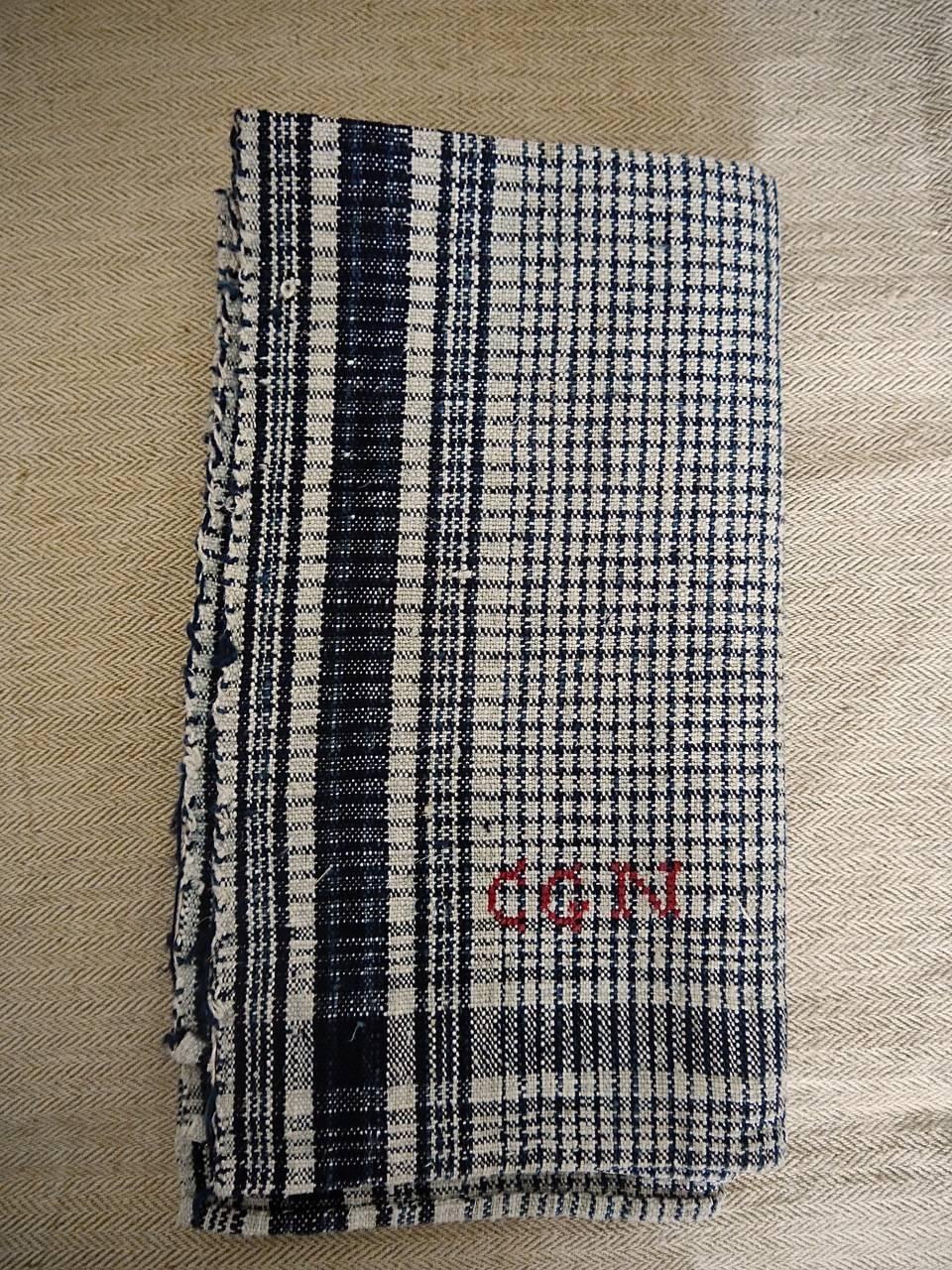 Late 19th century French indigo checked heavy linen square with a monogram CGN. Beautiful rustic piece.
Unused.