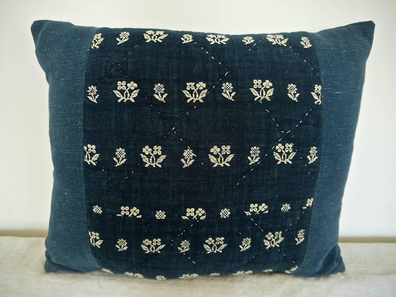 Late 18th century French wool woven on indigo linen cushion.
Rare to find this textile, also called cambresene, on an indigo ground, usually the wool floral motif is on a white linen. Simple and beautiful design. Cushion quilted with a diamond