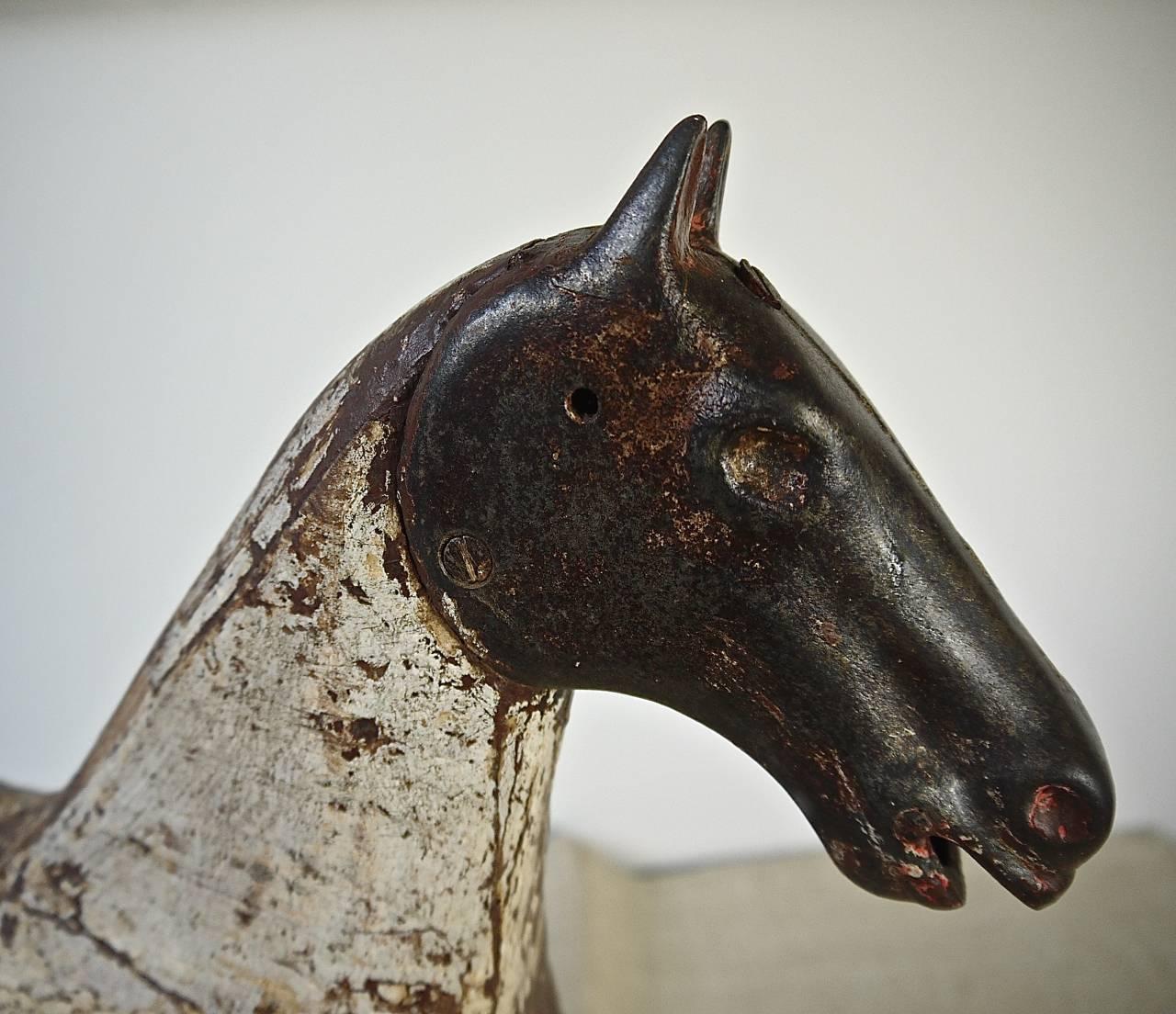 Carved 19th Century French Painted Toy Wooden Horse with an Iron Head