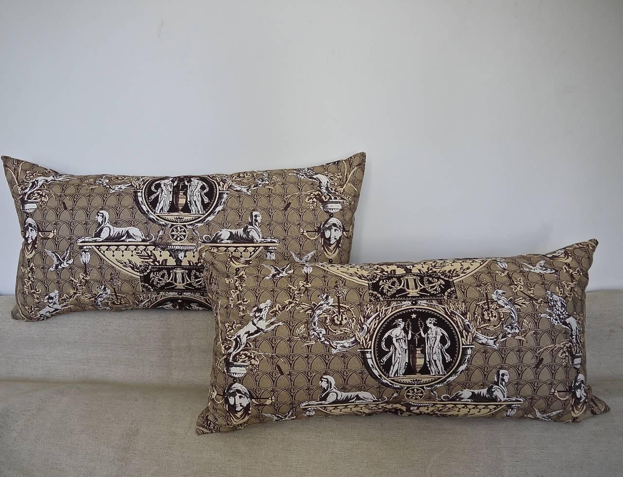 A pair of 1980s Brunschwig & Fils handprinted brown,cream and white toile cushions the design  called 'Les Sphinx Medaillons and are in a perfect unused condition.They are self-backed and slip-stitched closed with a duck feather insert.