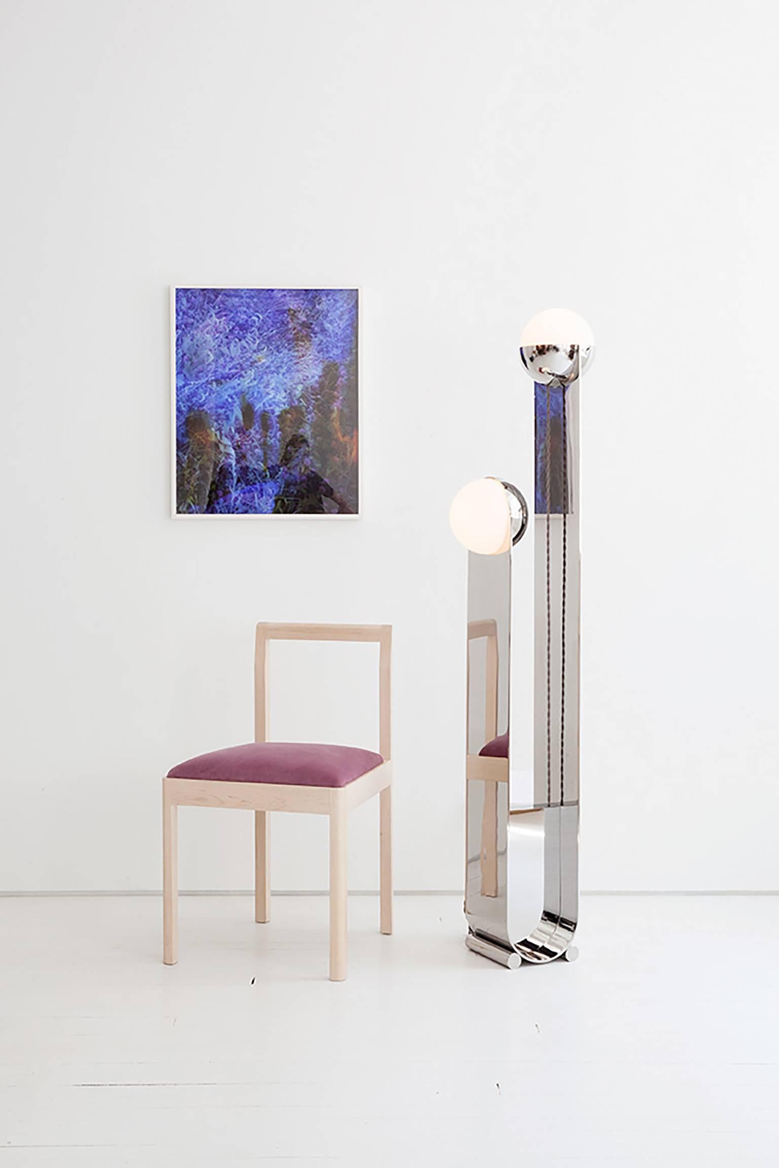 The Pete & Nora Floor Lamp is crafted in collaboration with our team of highly skilled local fabricators, and is available in polished stainless steel and handblown glass. The glass globes unscrew to allow access to the sockets, which are