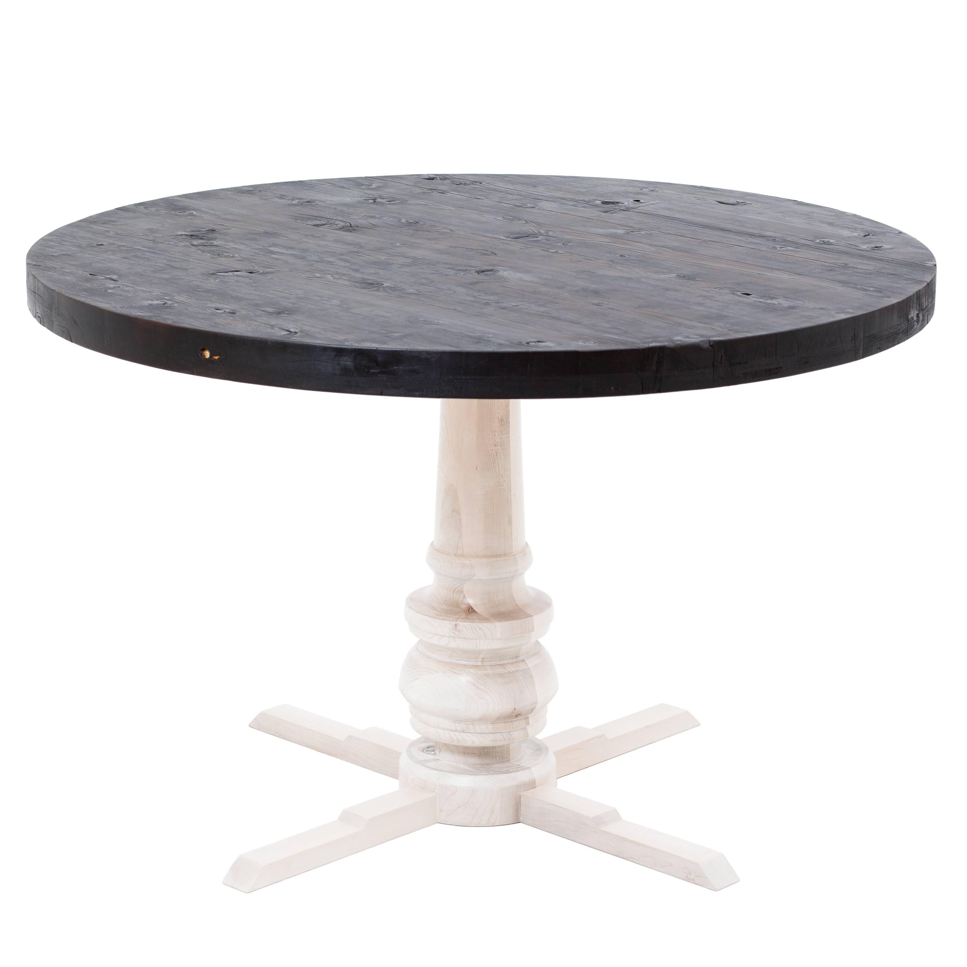 This modern interpretation of the Classic saloon table features a reclaimed water tower top that is torched and then sealed with oil. The hand-turned maple base is pickled white for a striking contrast.

This is a bespoke piece, custom dimensions,