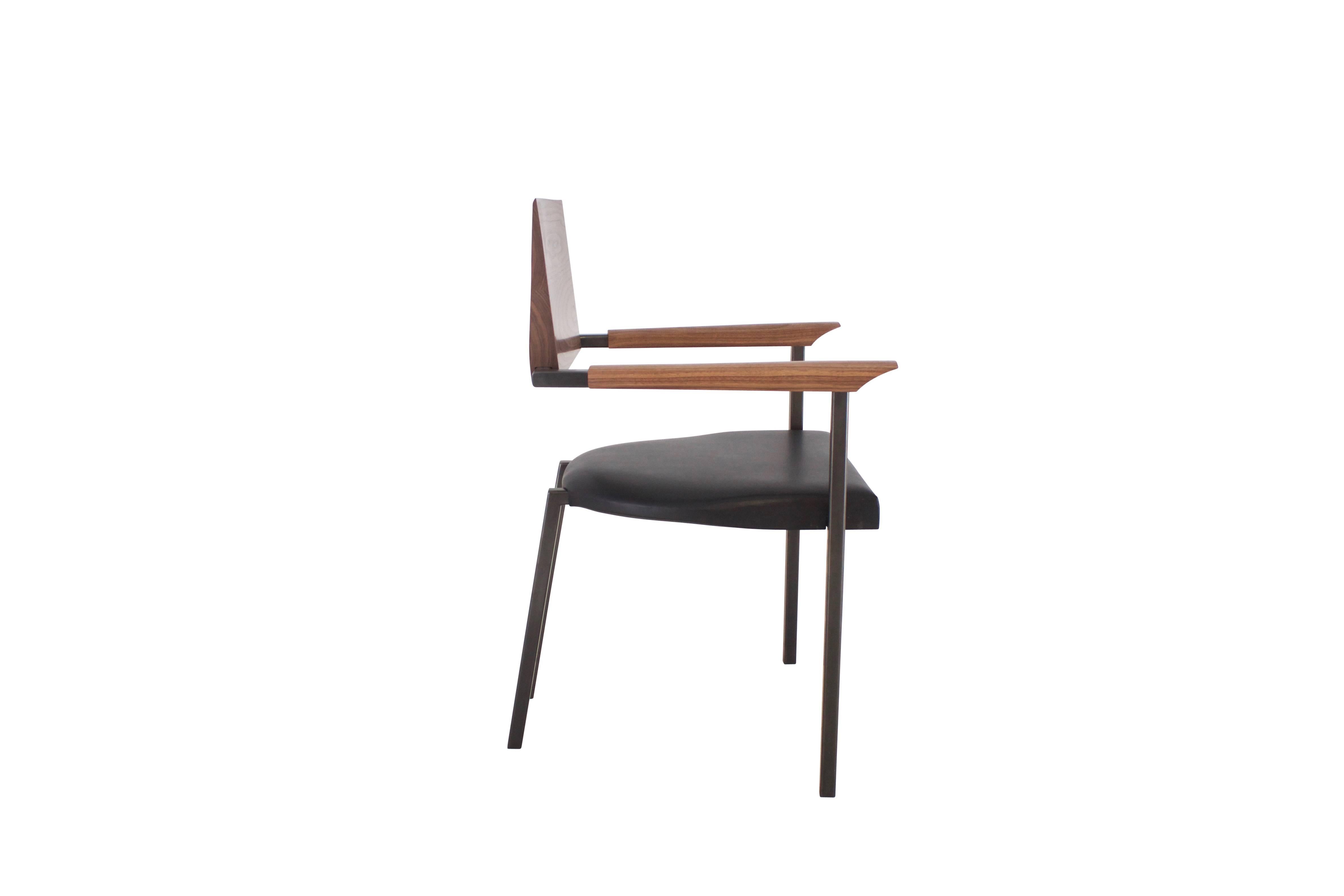 This chair evokes a feeling of solidity, weight and forward movement. Notable features are he 