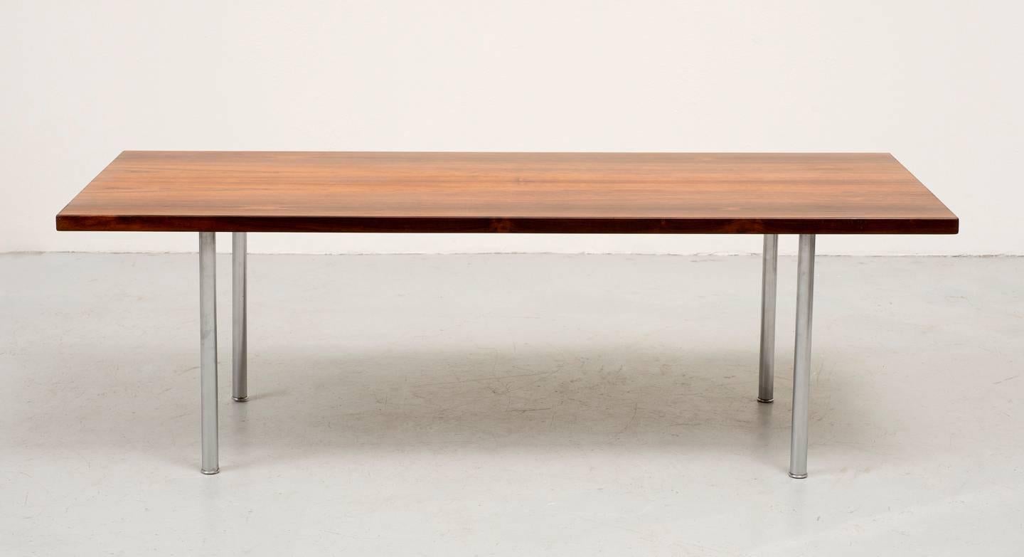 Coffee table with elegant rosewood top and chromed steel legs by Hans Wegner. Beautiful wood grain and color. For Andreas Tuck, circa 1950s.