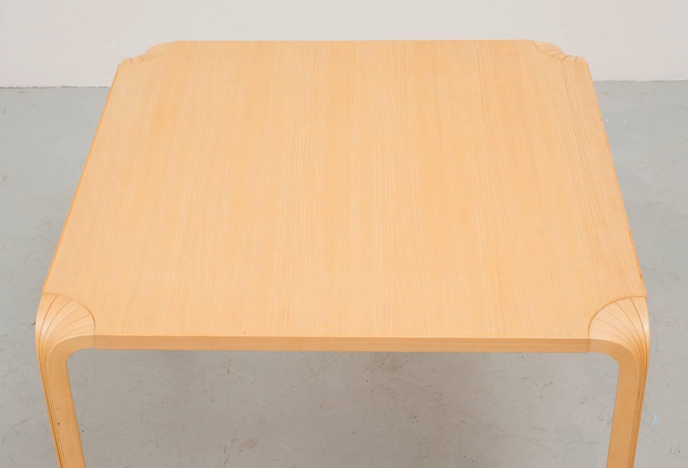Fan leg dining table by Alvar Aalto for Artek, circa 1950. Ash top and fluted birch legs which fan to meet the top.