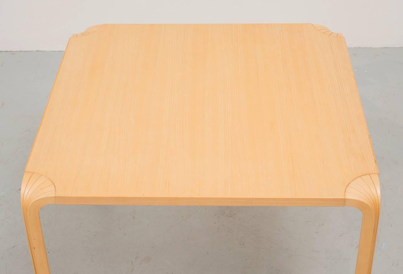 Fan leg dining table by Alvar Aalto for Artek, circa 1950. Ash top and fluted birch legs which fan to meet the top.