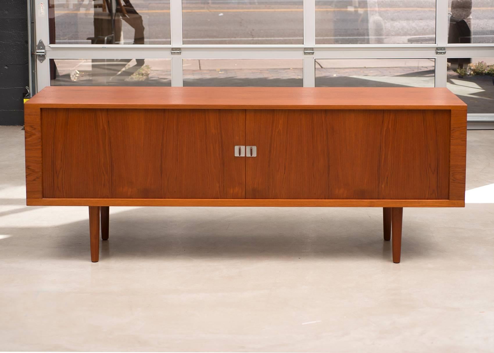 Large teak tambour door credenza with oak interior shelves and drawers, Model RY-25. Produced by Ry Mobler, Denmark, 1960s.