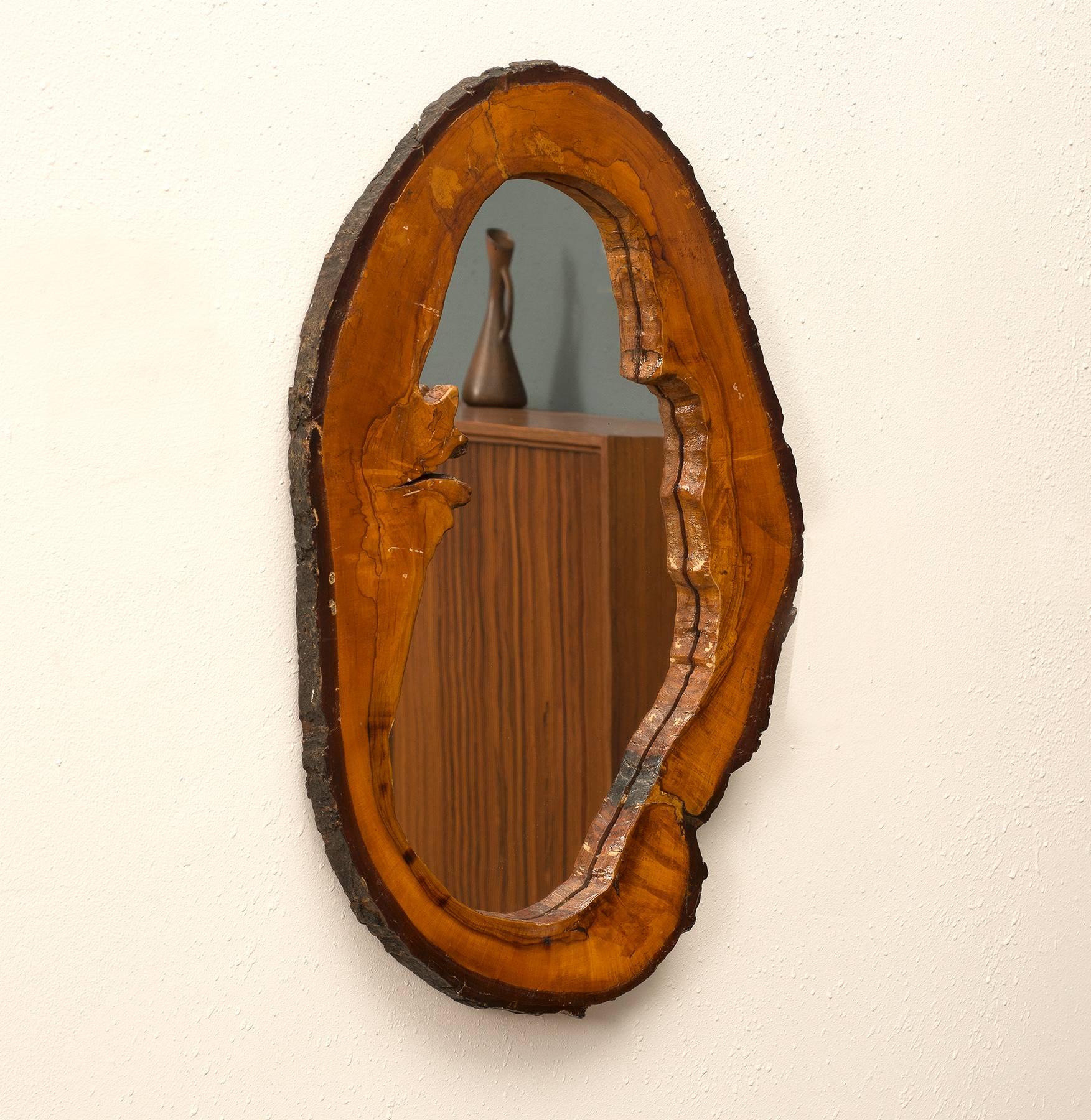 A lovely live edge mirror in walnut, 1950s.
