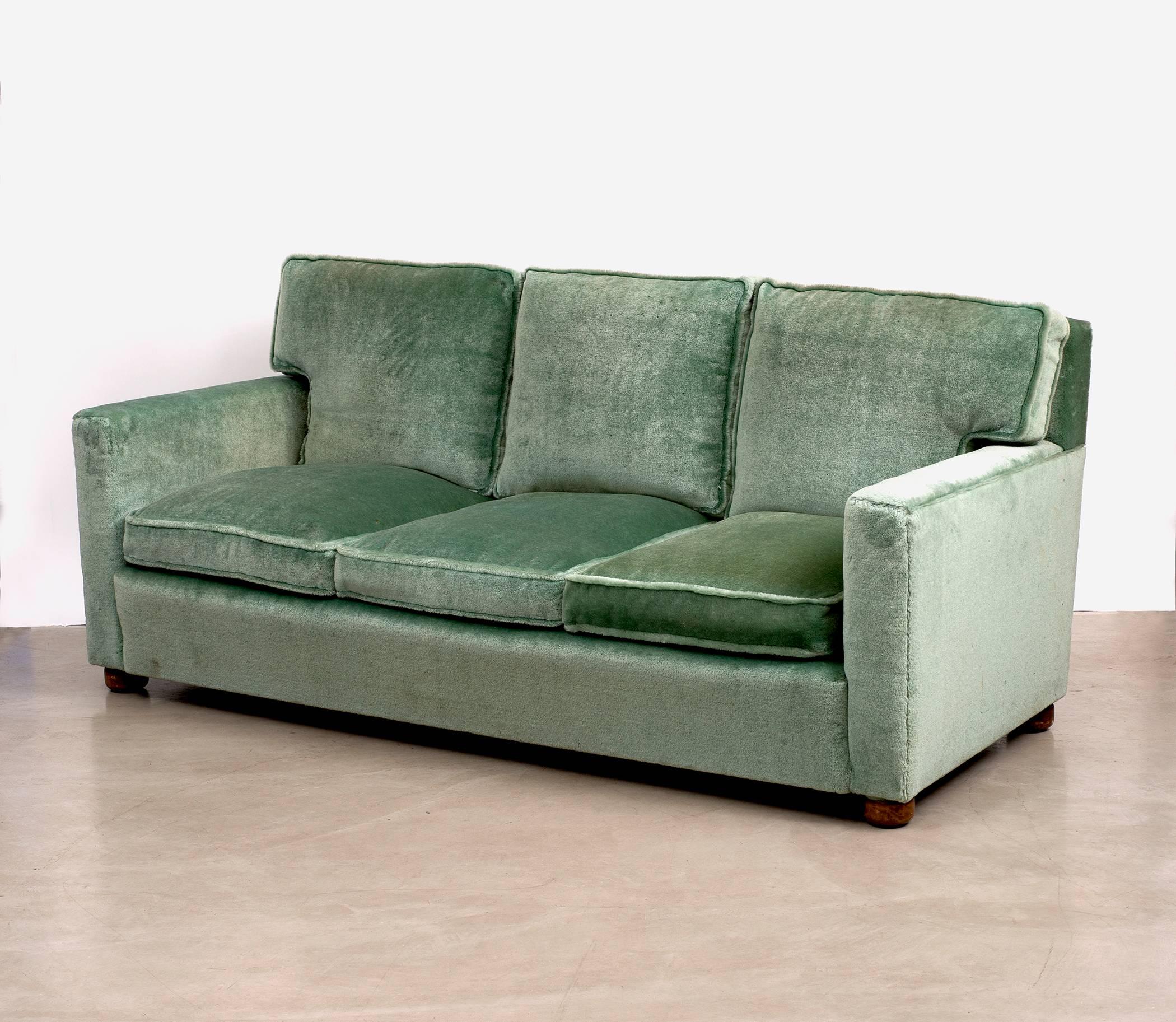 A sofa, model 3031, also known as the 