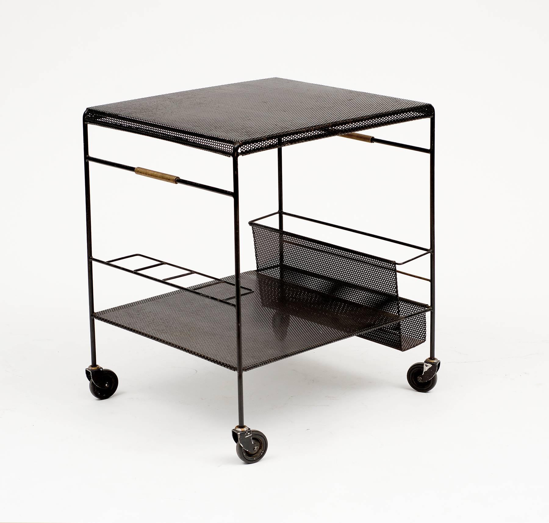Gorgeous bar cart by Mathieu Matégot in black lacquered metal with nice patina, France, 1950s.
