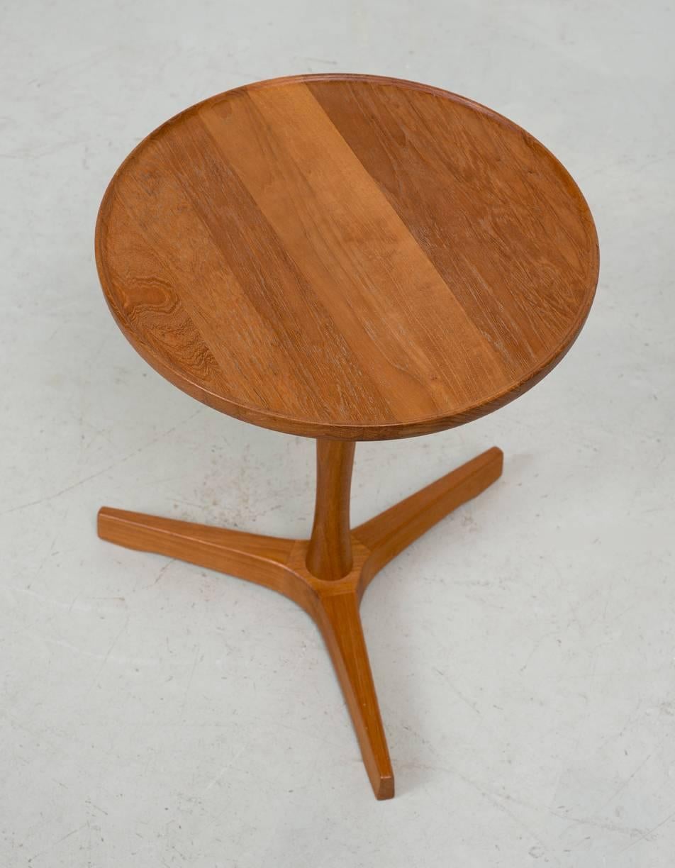 A turned teak side table by Hans Andersen on a tripod base, Denmark, 1960s.