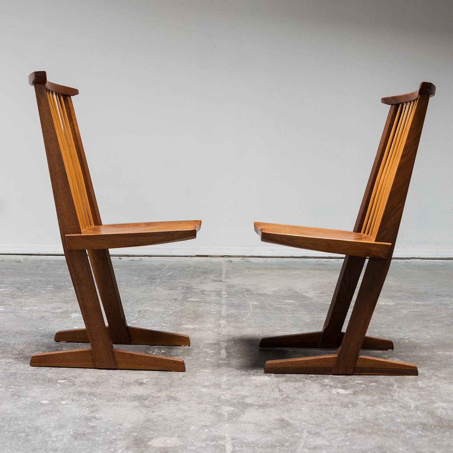 A gorgeous set of eight Conoid chairs by George Nakashima in American black walnut and hickory. New Hope, Pennsylvania, 1982.

The set comes with the original order document signed by George Nakashima.