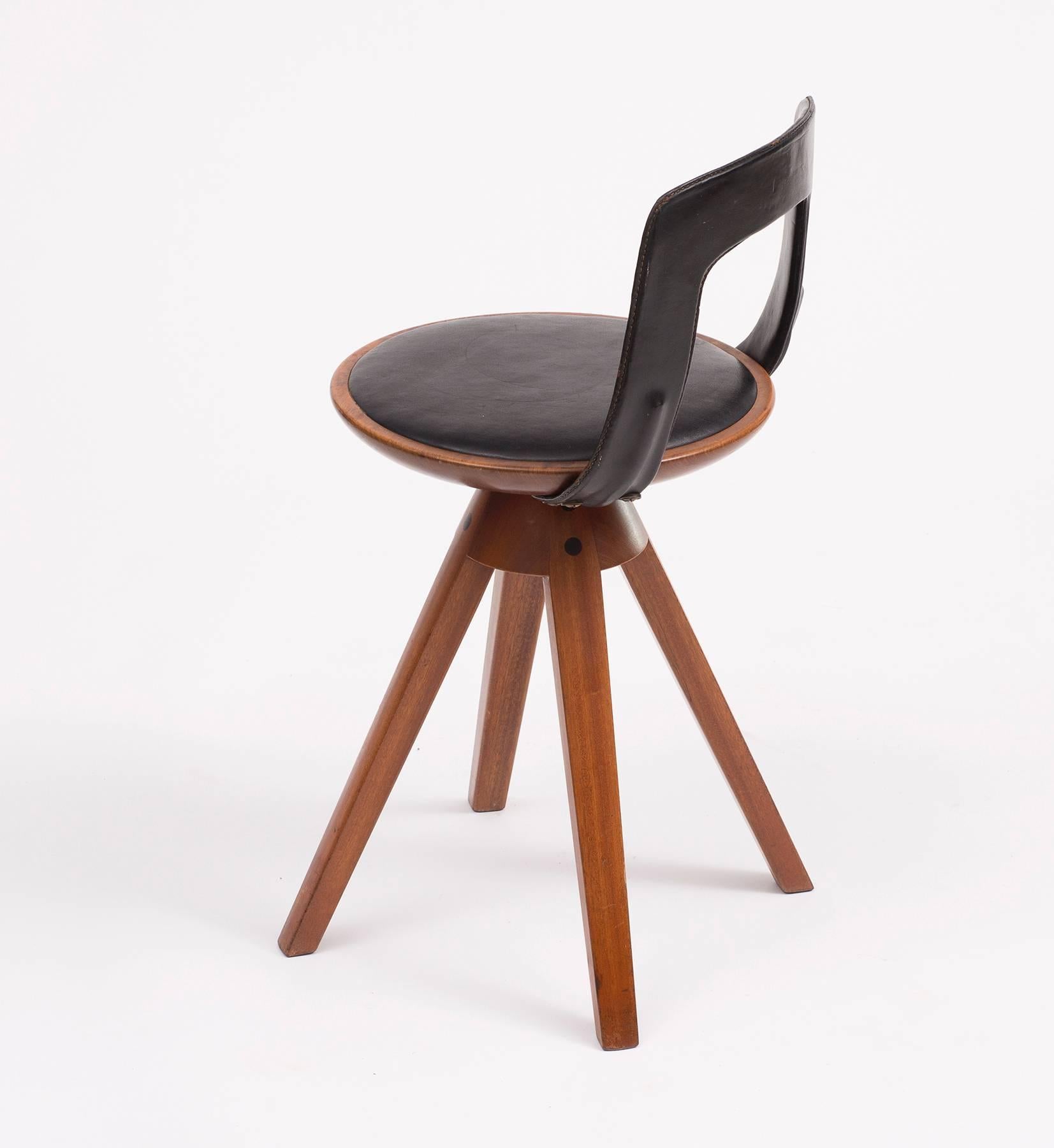 A swivel stool in teak and original black leather designed by Tove and Edvard Kindt-Larsen for Thorald Madsens Snedkeri, Denmark, 1957.