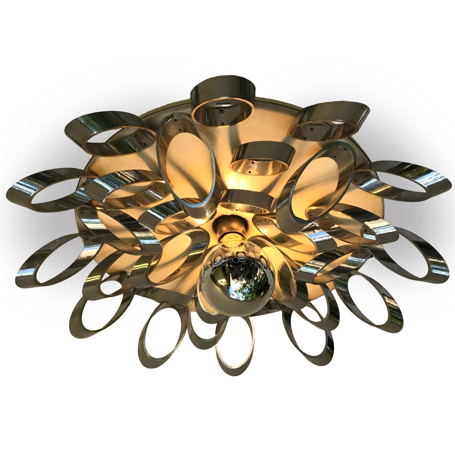 This unique and original Italian, one-light ceiling fixture, designed and handmade by a Milanese architect, circa 1970s, probably inspired by Gaetano Sciolari's creations.

This unusual ceiling light consists of a circular ivory painted metal disk,